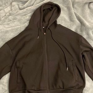 Exclusive Black Zip-up. Highly comfortable made of thick material.